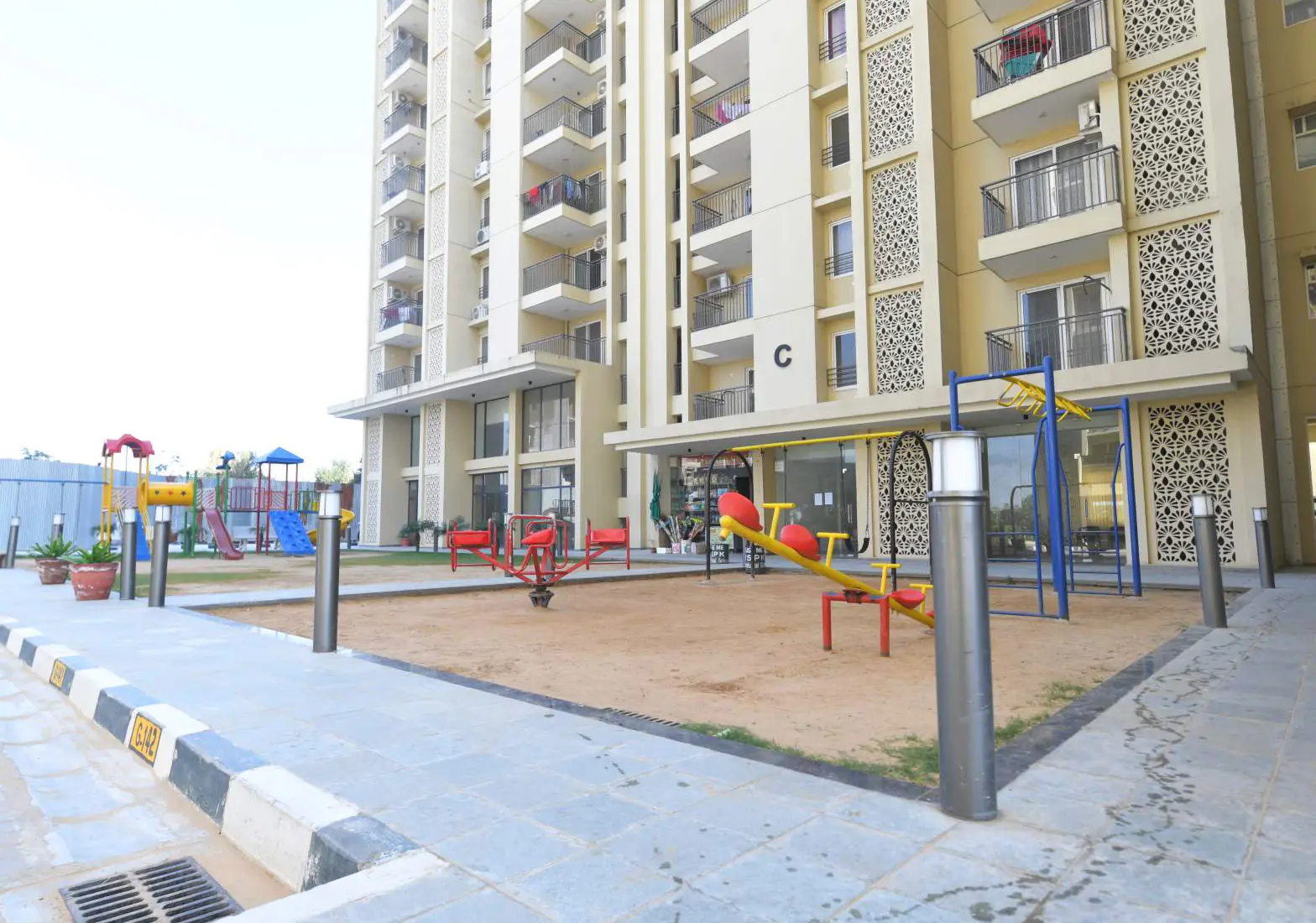 Kids play area with swings and slides